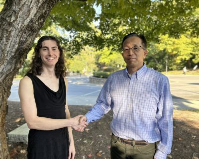 Barbara Smith Award winner Kairi Black with Hongkai Zhao, Chair. 