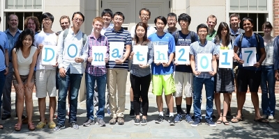 students holding DOmath 2017 sign