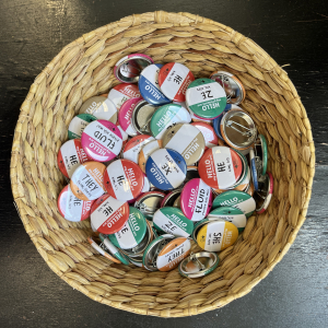 Pronoun pins in basket